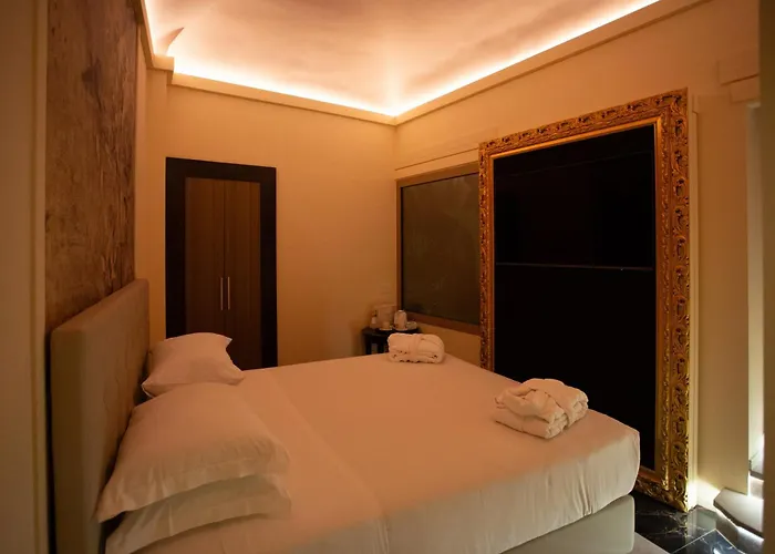 בית הארחה Profumo Maison Colosseo 4*